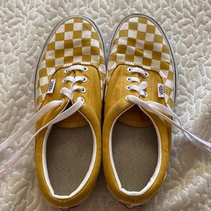 Vans era yellow and white checkered lace ups.